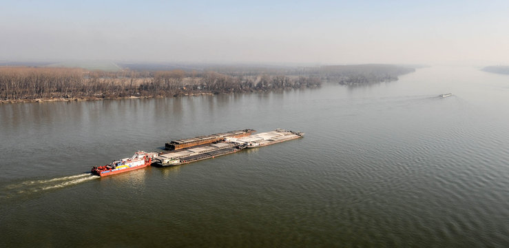 Aerial view on cargo ship sailing on the river Danube