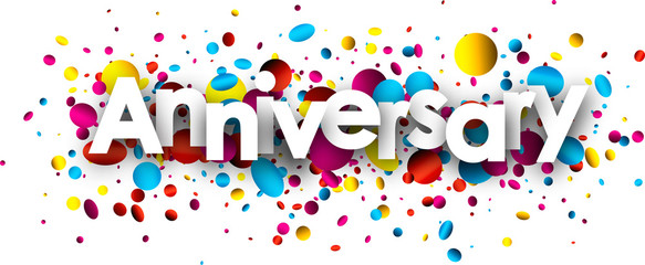 Obraz premium Anniversary background with colorful confetti.