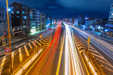 Fototapeta na wymiar Traffic lights on the street of Kyoto city at night, Japan