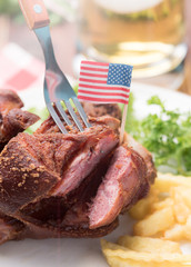 Deep Fried Pork Knuckle serve with French fried potatoes