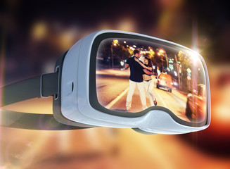 Virtual reality headset, double exposure. Young couple dancing tango on the quay