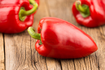 Pepper on the old wooden table.