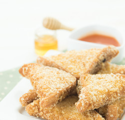 Fried bread slices with tasty sauce