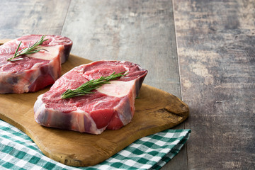 Raw meat on wooden background
