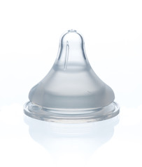 Transparent baby bottle nipple isolated on white © showcake