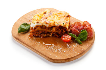 Lasagna on cutting board