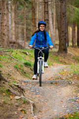 Fototapeta premium Healthy lifestyle - teenage girl cycling