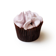 chocolate cupcake with cream on white background