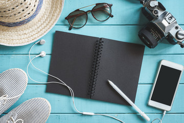 Traveler's accessories, cellphone and notebook with copy space