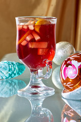 Hot mulled wine in a glass cup