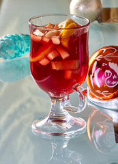 Hot mulled wine in a glass cup