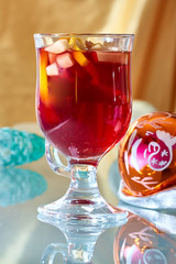 Hot mulled wine in a glass cup