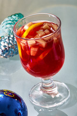 Hot mulled wine in a glass cup
