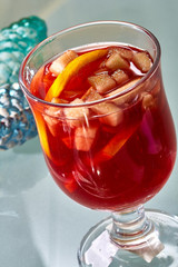 Hot mulled wine in a glass cup