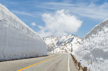 Empty road and snow wall at japan alps tateyama kurobe alpine route