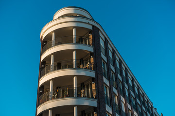 Fototapeta na wymiar luxury building with curved balconies