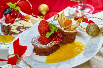 Cupcake with fresh fresh berries decoration on the table
