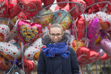 Fototapeta premium GOMEL, BELARUS - 6 March 2017: Portrait of a beautiful girl against the background of balloons