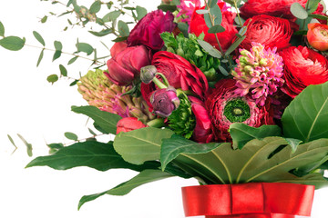 Ranunkulyus bouquet of red flowers on a white background