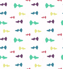 seamless pattern with guppy silhouettes on white background