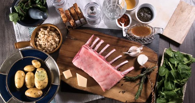 Stop motion  view of the preparation of a minted rack of lamb with spinach and mushy potatoes