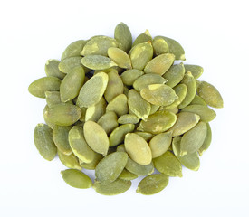 Pumpkin seeds on white background