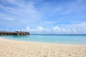 Fototapeta na wymiar Maldivian beach and water villas. Maafushivaru, Ari Atoll