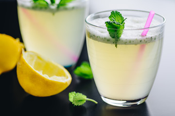 Refreshing cocktail with lemon and mint