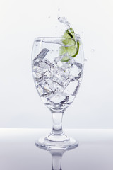Lime splashes in water.