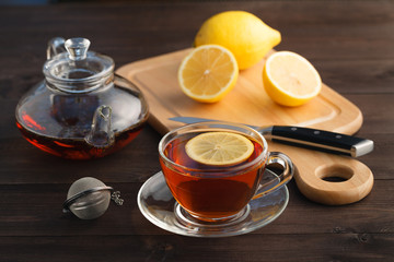 Cup of tea with lemon on table close-up
