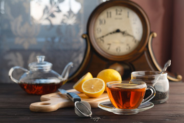 Obraz na płótnie Canvas Teapot, cup and hot tea.