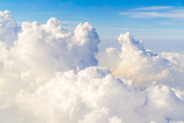 Fototapeta na wymiar Sky and Cloud top view from airplane window.