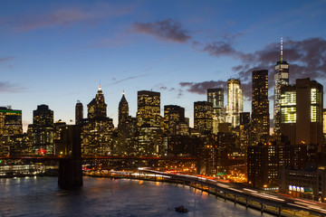 Fototapeta na wymiar Manhattan Night Lights Skyline at Dusk in New York City NYC
