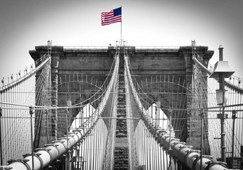 American flag on Brooklyn Bridge in New York City in Black and White