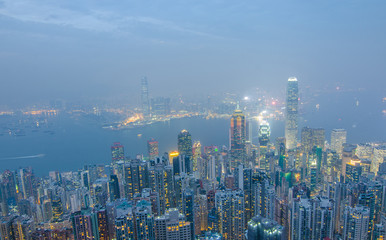 Hong Kong the scenes, victoria harbour from the peak bird view, in the mist with bad weather in the...