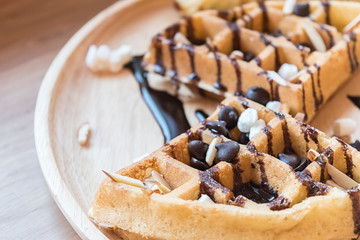 delicious sweet dessert : homemade waffle with chocolate sauce