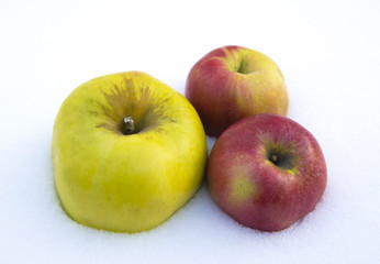 Fresh apples on the snow