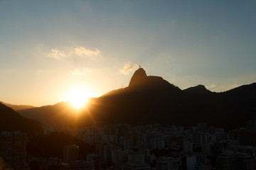 Sunset behind Mountain Corcovado Christ the Redeemer, Rio de Janeiro