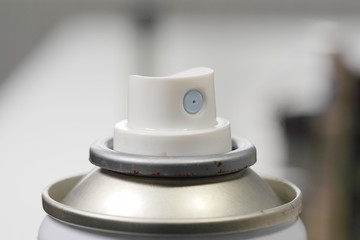 Aerosol spray cans nozzle close up