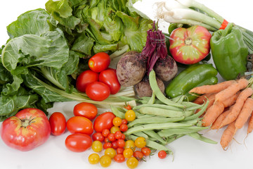 Different seasonal vegetables on white