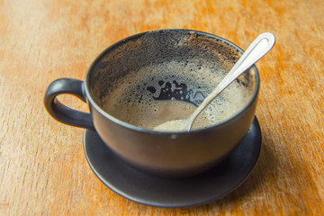 A cup depleted of coffee