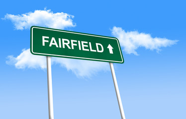 Road sign - Fairfield. Green road sign (signpost) on blue sky background. (3D-Illustration)
