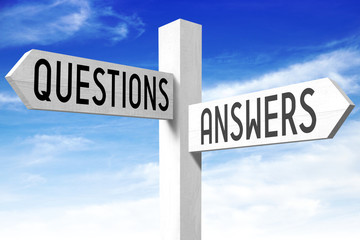 Obraz premium Questions, answers - wooden signpost