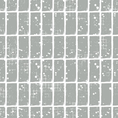 Seamless vector checkered pattern. Creative geometric pastel background with rectangles. Grunge texture with attrition, cracks and ambrosia. Old style vintage design. Graphic illustration.