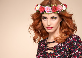 Fashion Beautiful Curly Redhead Portrait in Flower Wreath. Shiny Curly flower fashion Volume Hairstyle. Happy Beauty Model Woman. Glamour Confident Sexy lady, fashion Makeup, Boho wreath, Trendy Dress