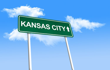 Road sign - Kansas City. Green road sign (signpost) on blue sky background. (3D-Illustration)
