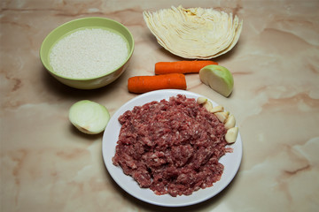 Fresh food to prepare lazy cabbage rolls or meatballs of beef,