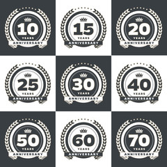 Vector set of anniversary signs, symbols. 10, 15, 20, 25, 30, 40, 50, 60, 70 years jubilee design elements collection.