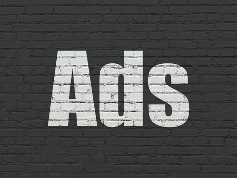 Marketing concept: Ads on wall background