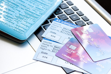 Payment online concept with cards and tickets on light table